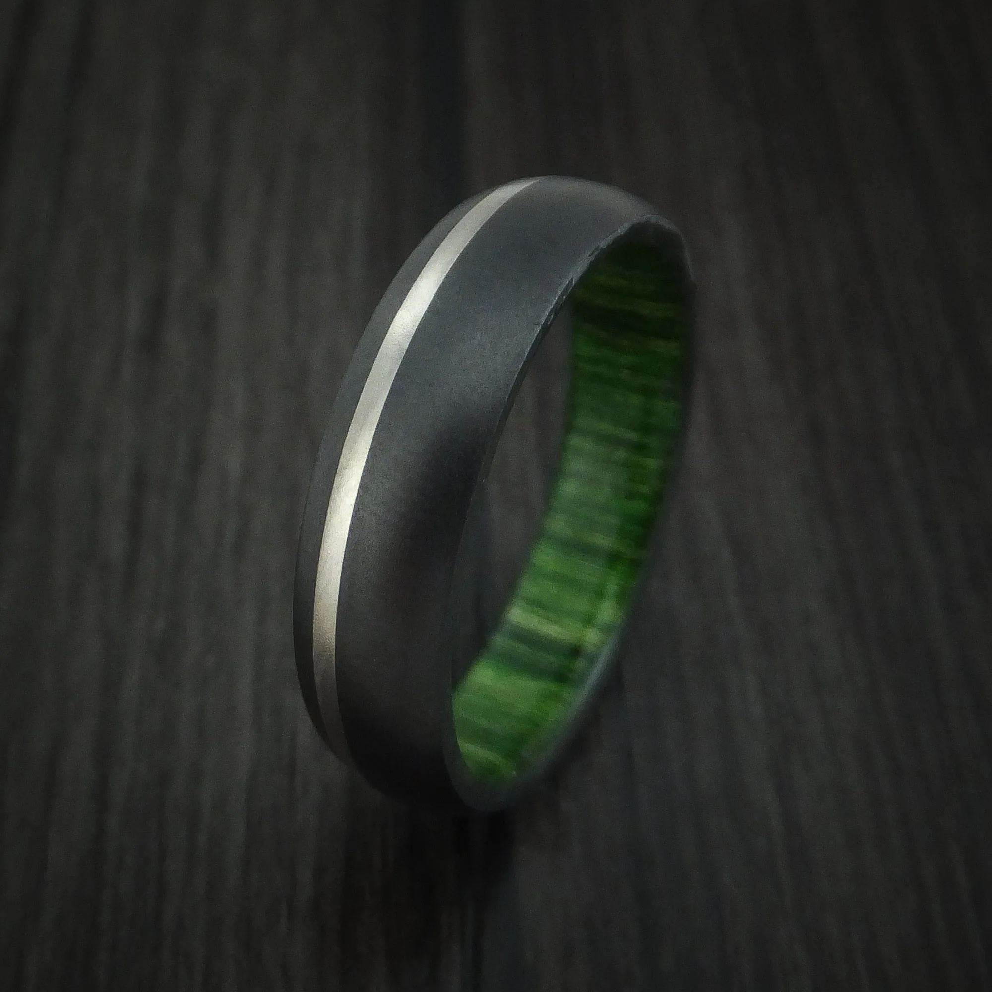 Black Titanium Men's Ring with Platinum Inlay and Jade Wood Sleeve