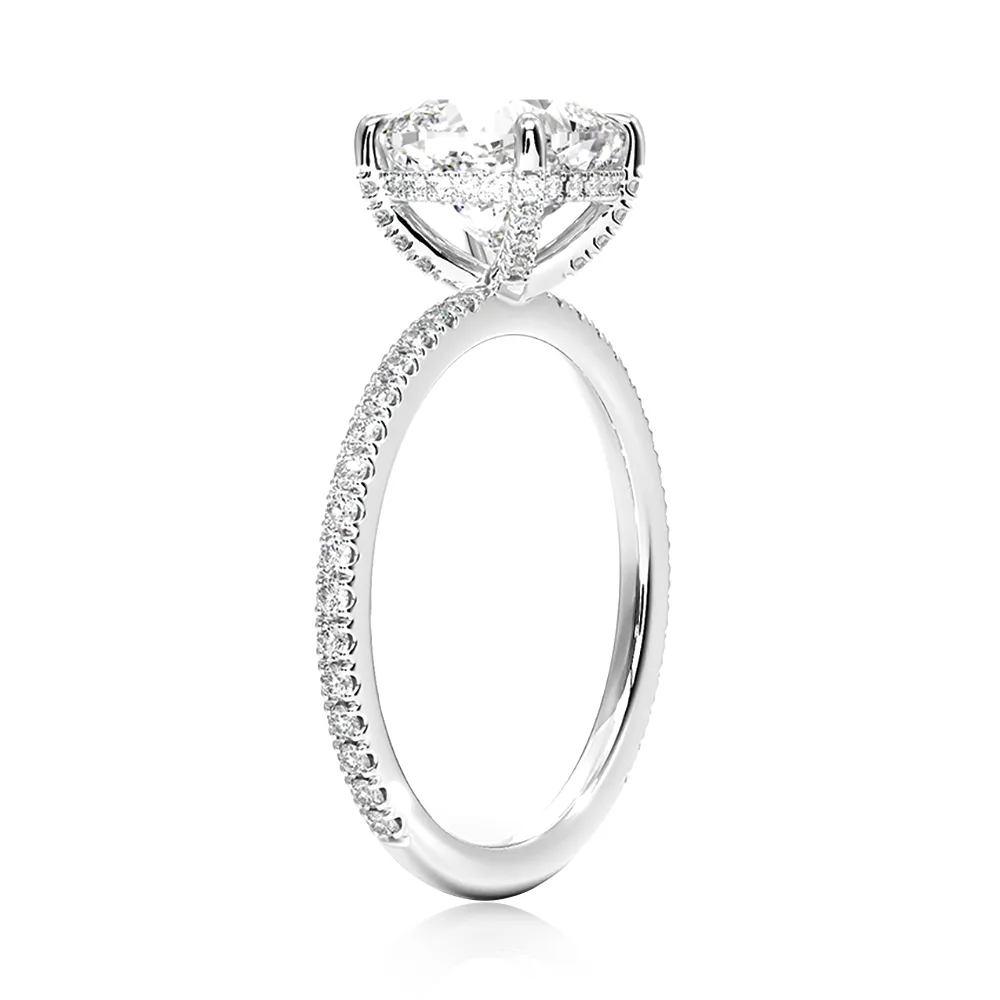 Cushion Cut Engagement Ring With Hidden Halo