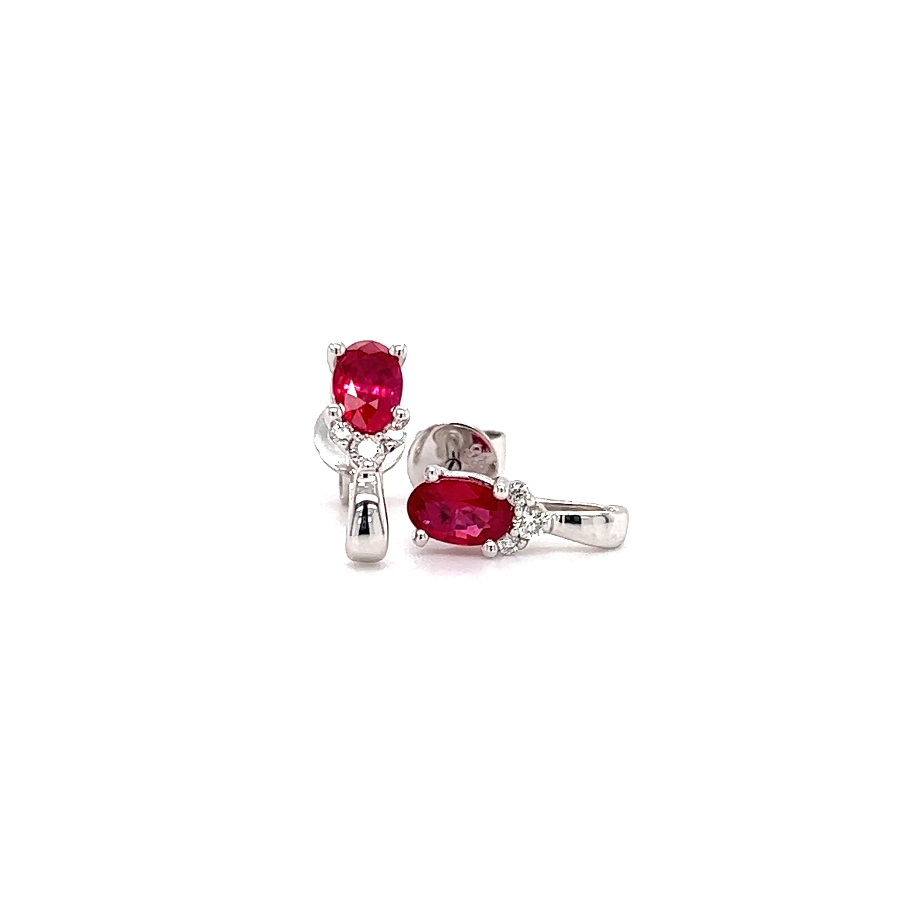 Oval Ruby Stud Earrings with Accent Diamonds in 14K White Gold